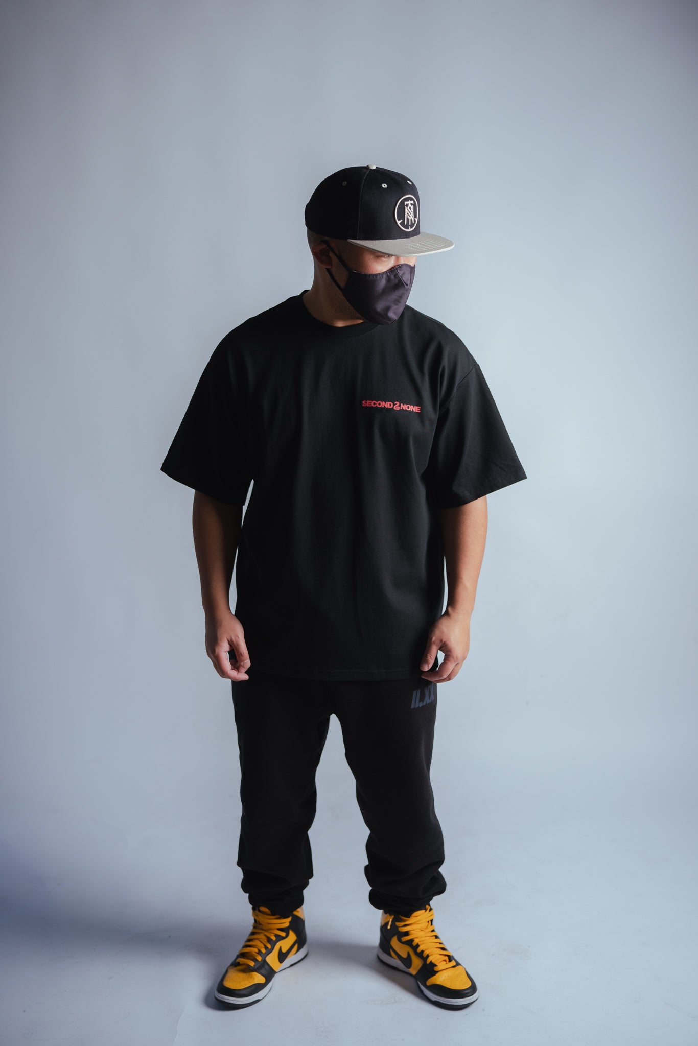 "X RINGS" TEE