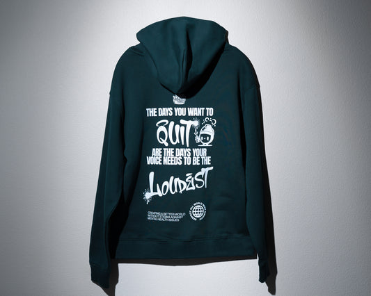 a pine green hoodie with a graphic that says the days you want to quit are the days your voice needs to be the loudest